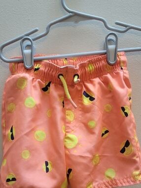Cat & Jack Coral Swim Shorts with Yellow Sun Motif